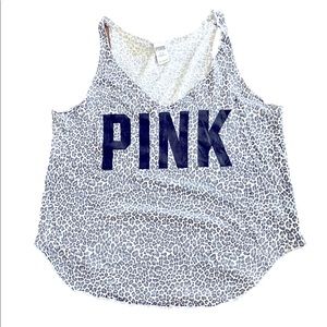 EC. PINK cheetah flowy tank top. Black logo on front . Butter soft .